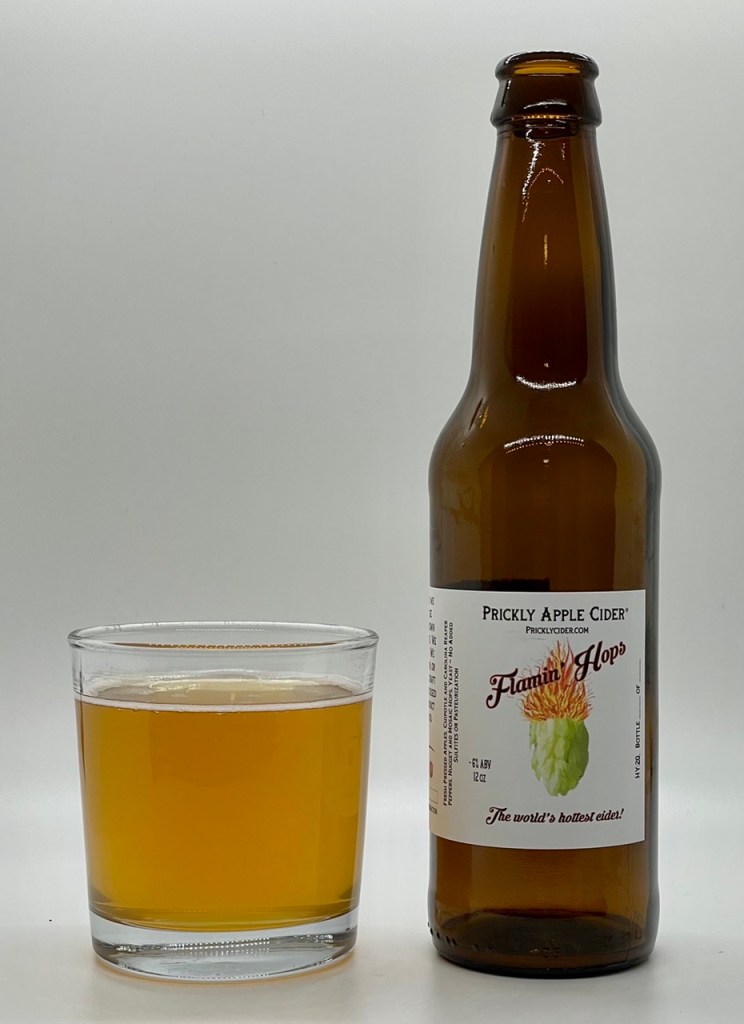 Bottle and glass of Flamin’ Hops cider.