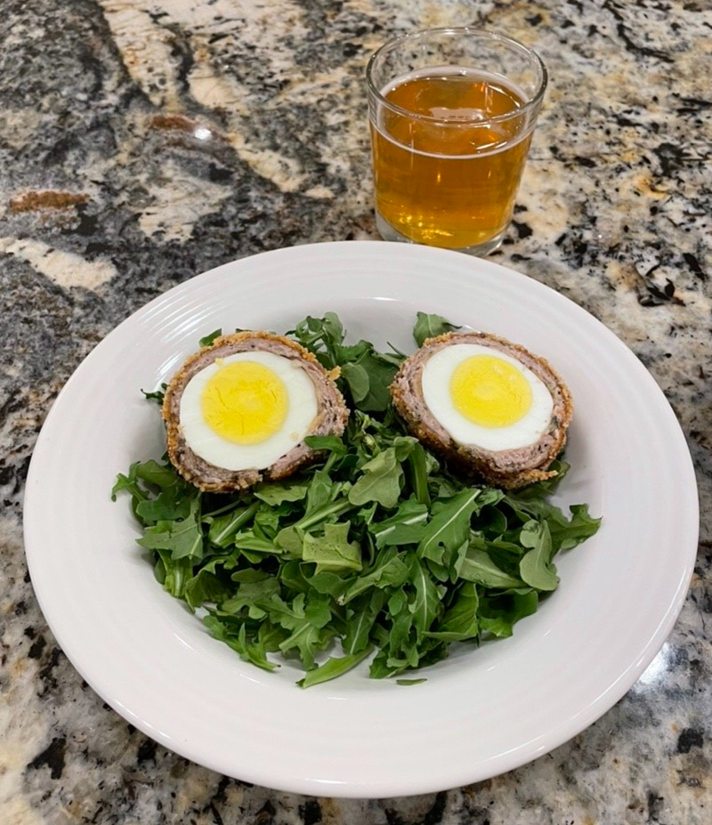 Scotch Egg on Arugula with Cider